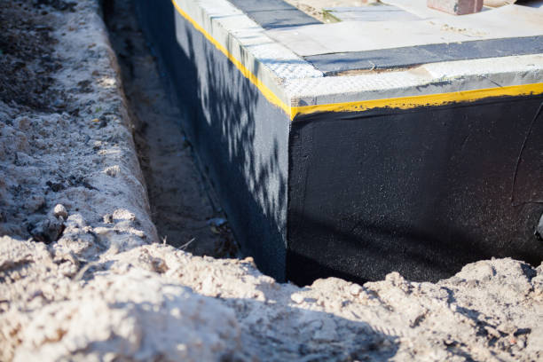 Professional Waterproofing technician working in Crawford, TN